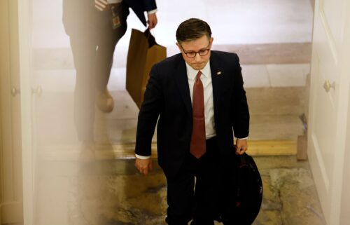 Speaker of the House Mike Johnson walks to his office in the US Capitol Building on September 25 in Washington