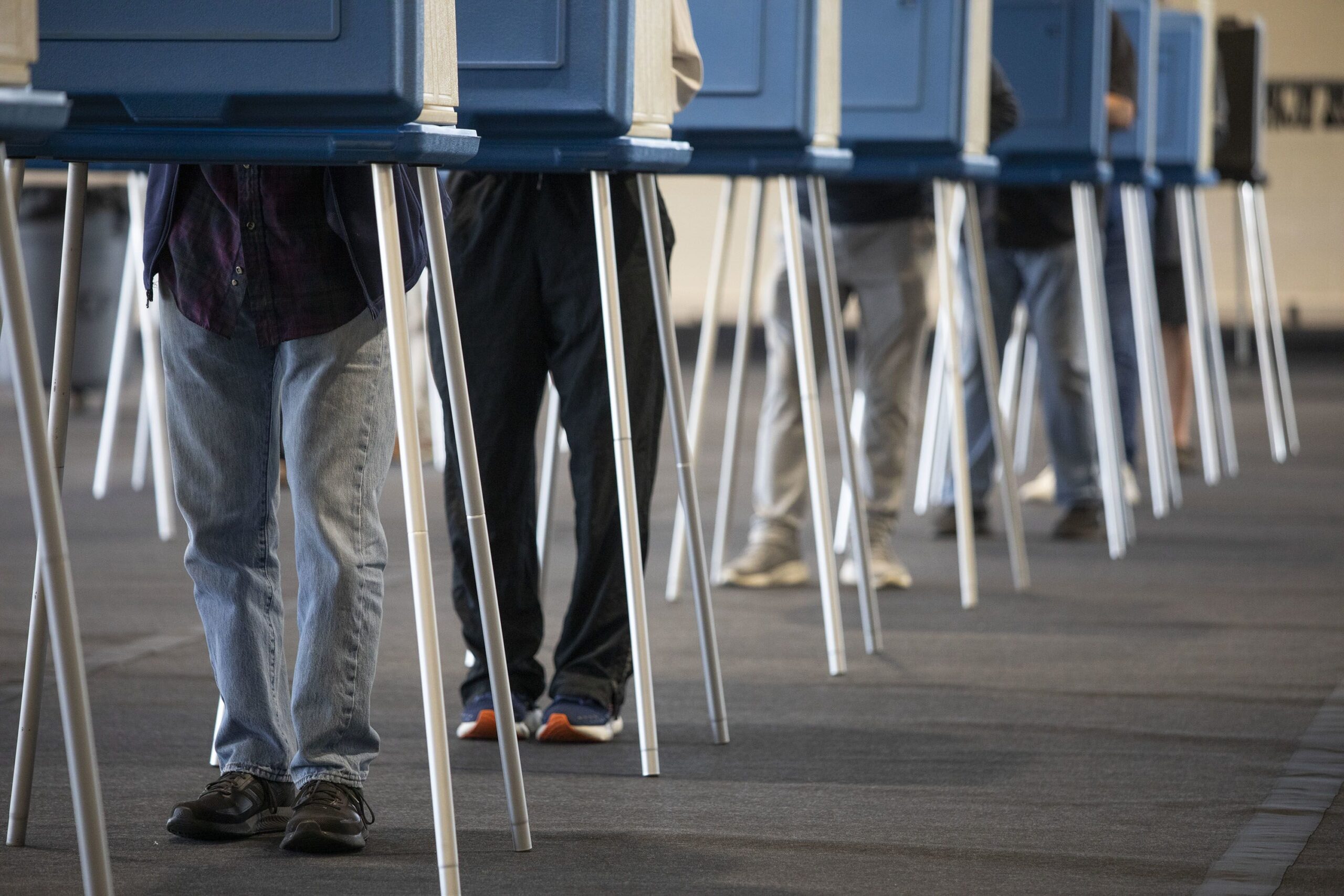 <i>Bill Pugliano/Getty Images via CNN Newsource</i><br/>Voters cast their ballots during Michigan's early voting period on October 29