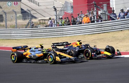 Norris (left) and Verstappen race through a turn during the US Grand Prix.