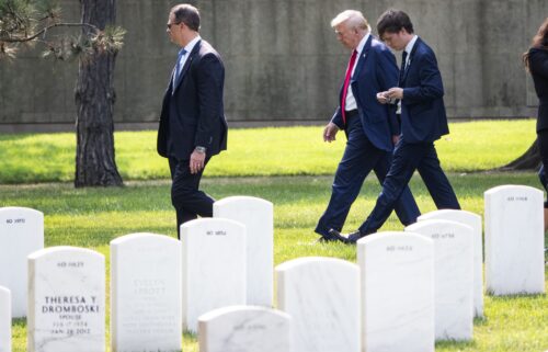 Former President Donald Trump leaves Section 60 of Arlington National Cemetery after he attended a ceremony honoring the lives of those who died at the Abbey Gate Bombing