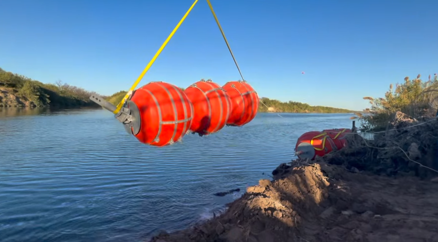 An image of the buoys being installed in the Rio Grande River.