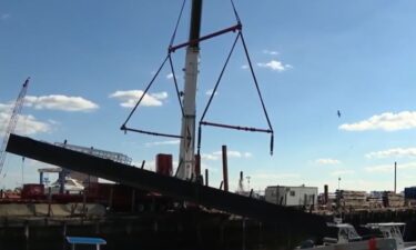 A crane strap gave way in East Boston