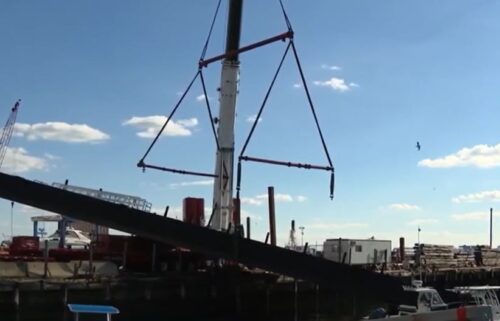 A crane strap gave way in East Boston