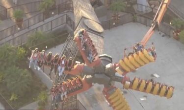 A group of Knott's Berry Farm park-goers was stuck midair on  "Sol Spin" for hours  after the ride came to an abrupt halt.