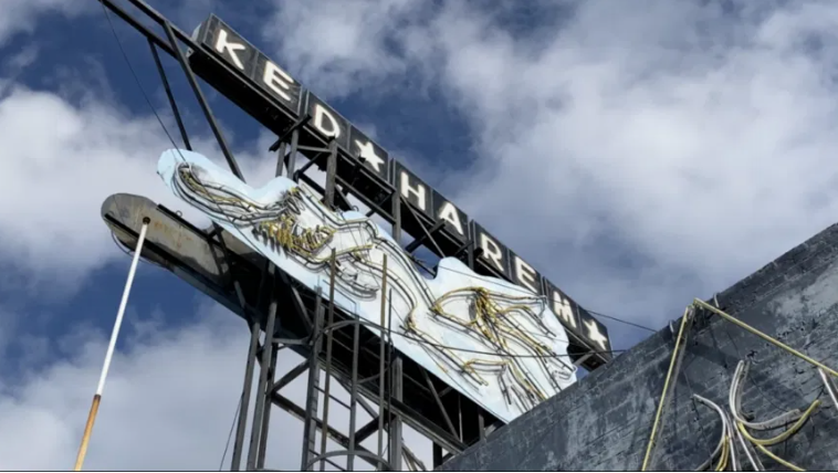 The Naked Harem sign in the Lower Valley as it was being removed in 2021.