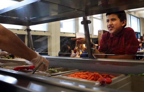 Kids like free school meals. States are trying to reel in the costs.