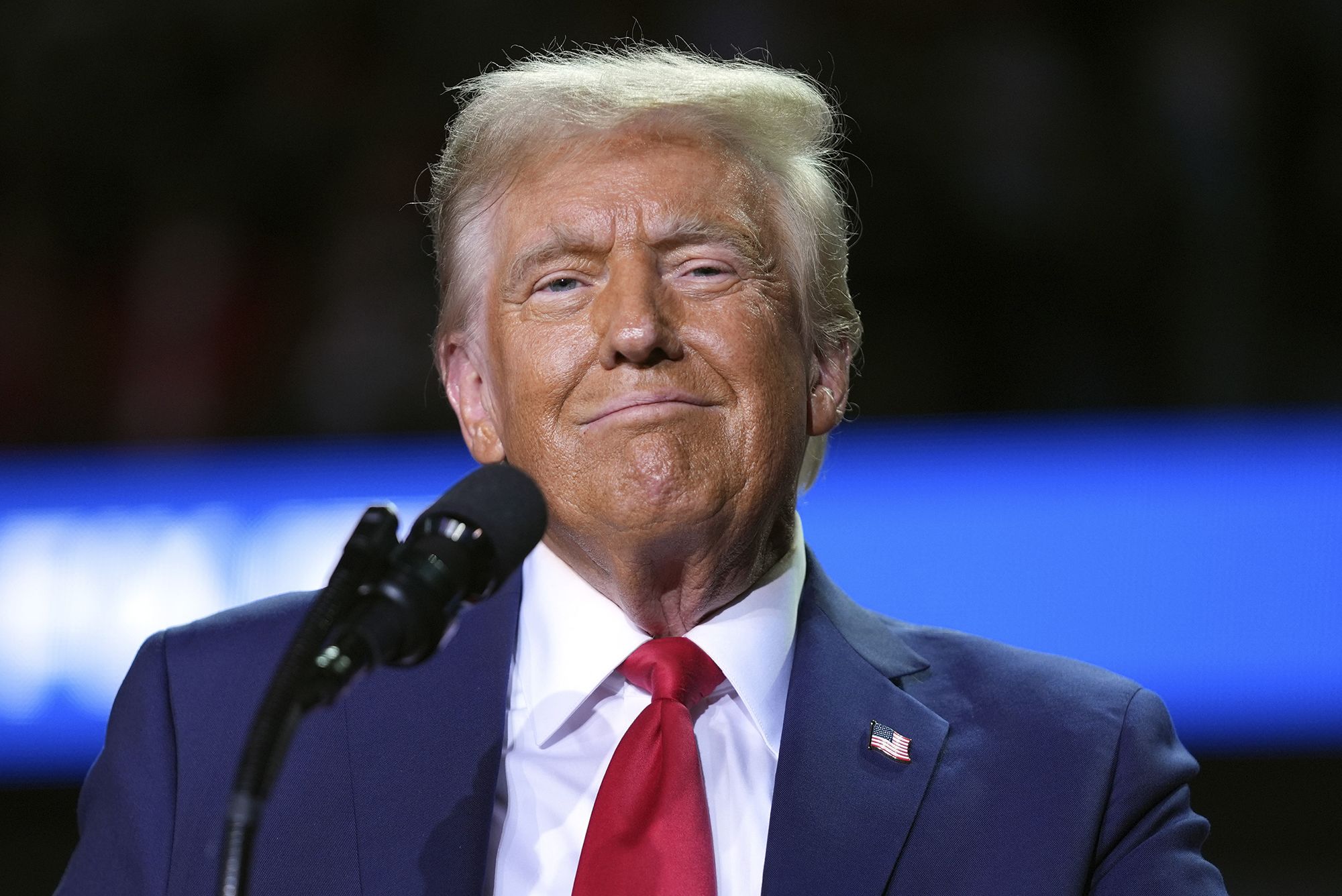 <i>Evan Vucci/AP via CNN Newsource</i><br/>Republican presidential nominee former President Donald Trump speaks at a campaign rally at Van Andel Arena