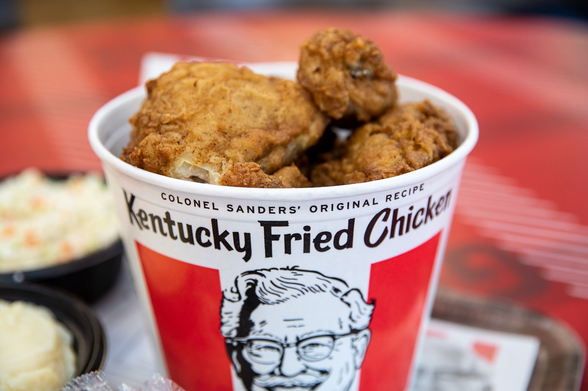 A bucket of fried chicken is arranged for a photograph at a Yum! Brands Inc. Kentucky Fried Chicken (KFC) restaurant in Norwell, Massachusetts on July 25, 2019.