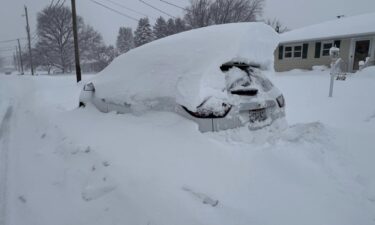 Lake-effect snow buried a vehicle in Pennsylvania's Millcreek Township.