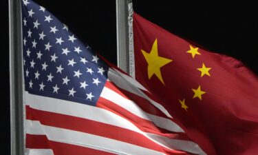 The American and Chinese flags wave at Genting Snow Park in February 2022