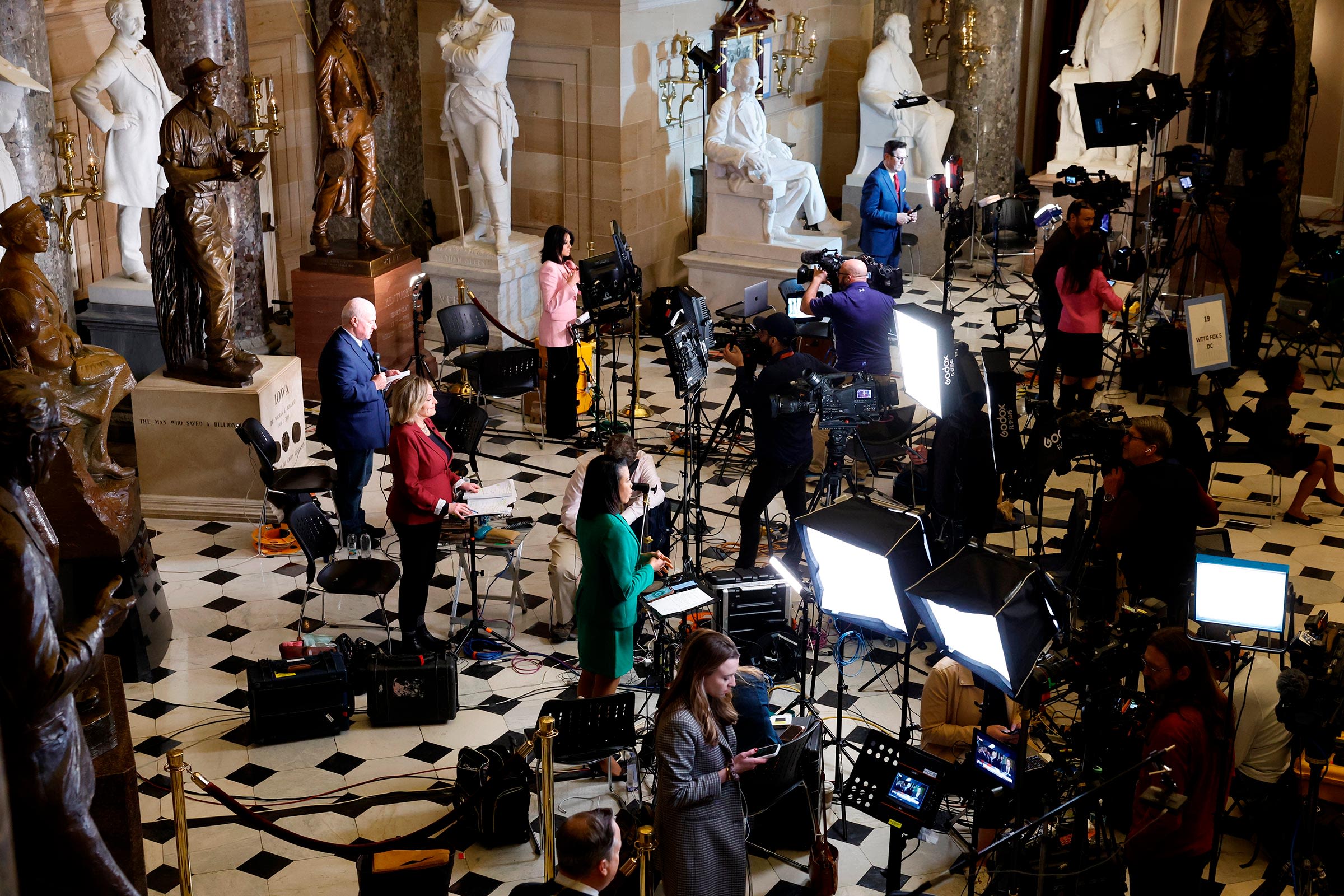 <i>Ting Shen/Bloomberg/Getty Images via CNN Newsource</i><br/>Members of the media in Statuary Hall ahead of a State of the Union address at the US Capitol in Washington