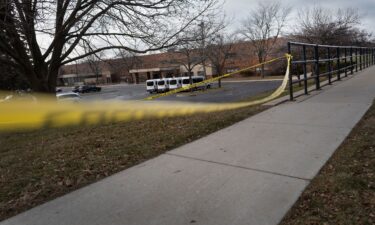 Crime scene tape is stretched around Abundant Life Christian School in Madison