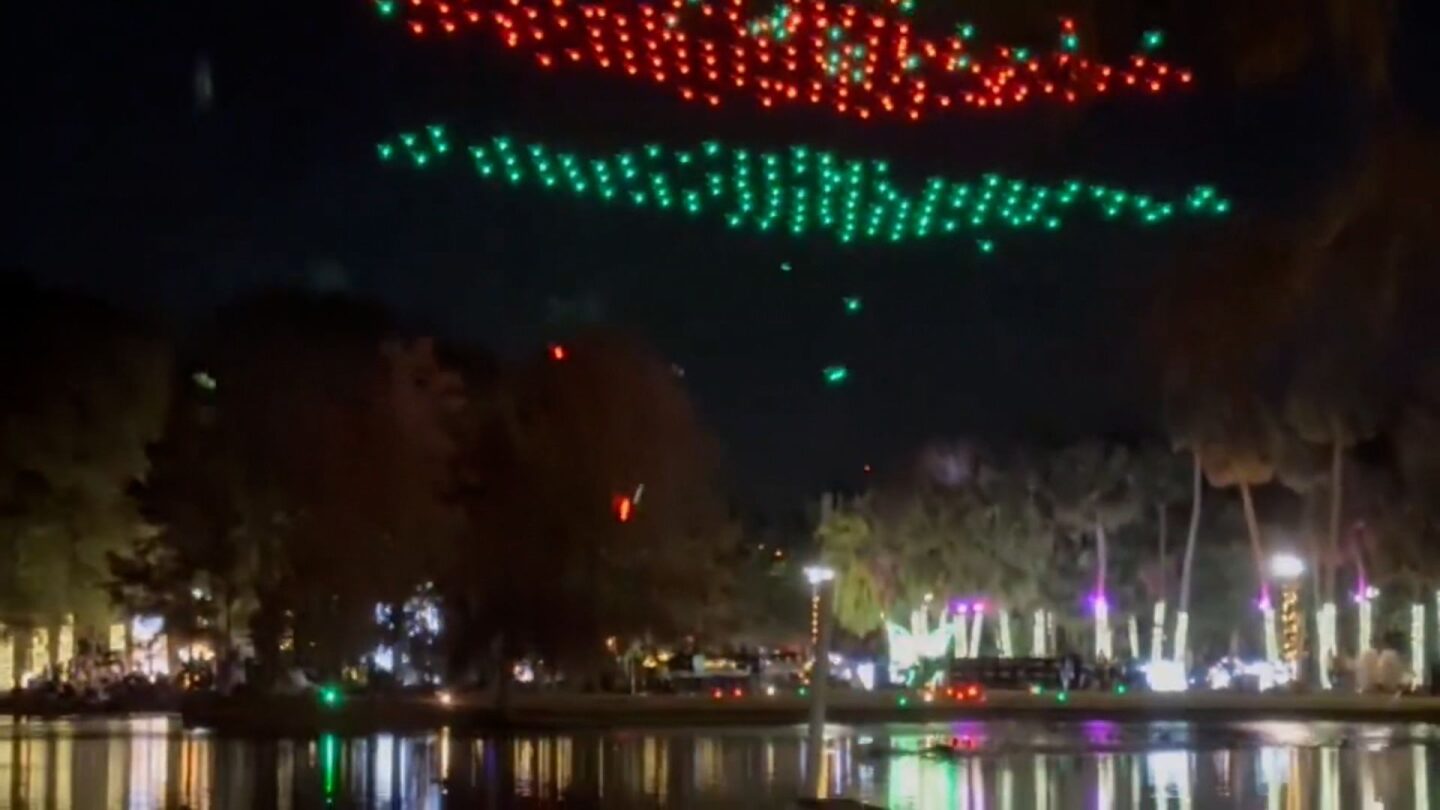 <i>MosquitoCoFL/X via CNN Newsource</i><br/>Drones fall to the ground during a Christmas-themed show at Orlando’s Lake Eola Park on December 21.