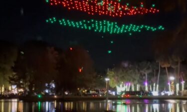 Drones fall to the ground during a Christmas-themed show at Orlando’s Lake Eola Park on December 21.