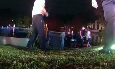 An 80-year-old man was rescued from a partially submerged vehicle on Wednesday morning