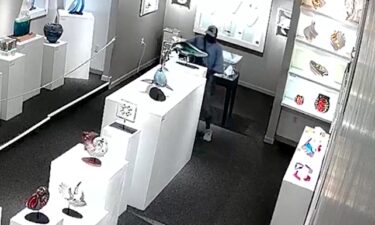 Detectives in Florida are looking for an alleged art thief after surveillance footage shows a man walking into a gallery and leaving with a $21