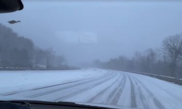 A couple slides off a road in Red River Gorge following the KY snowstorm.