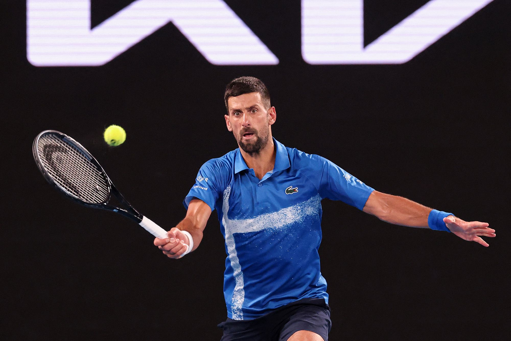 <i>Cameron Spencer/Getty Images via CNN Newsource</i><br/>Fans cheer for Djokovic at the Australian Open.