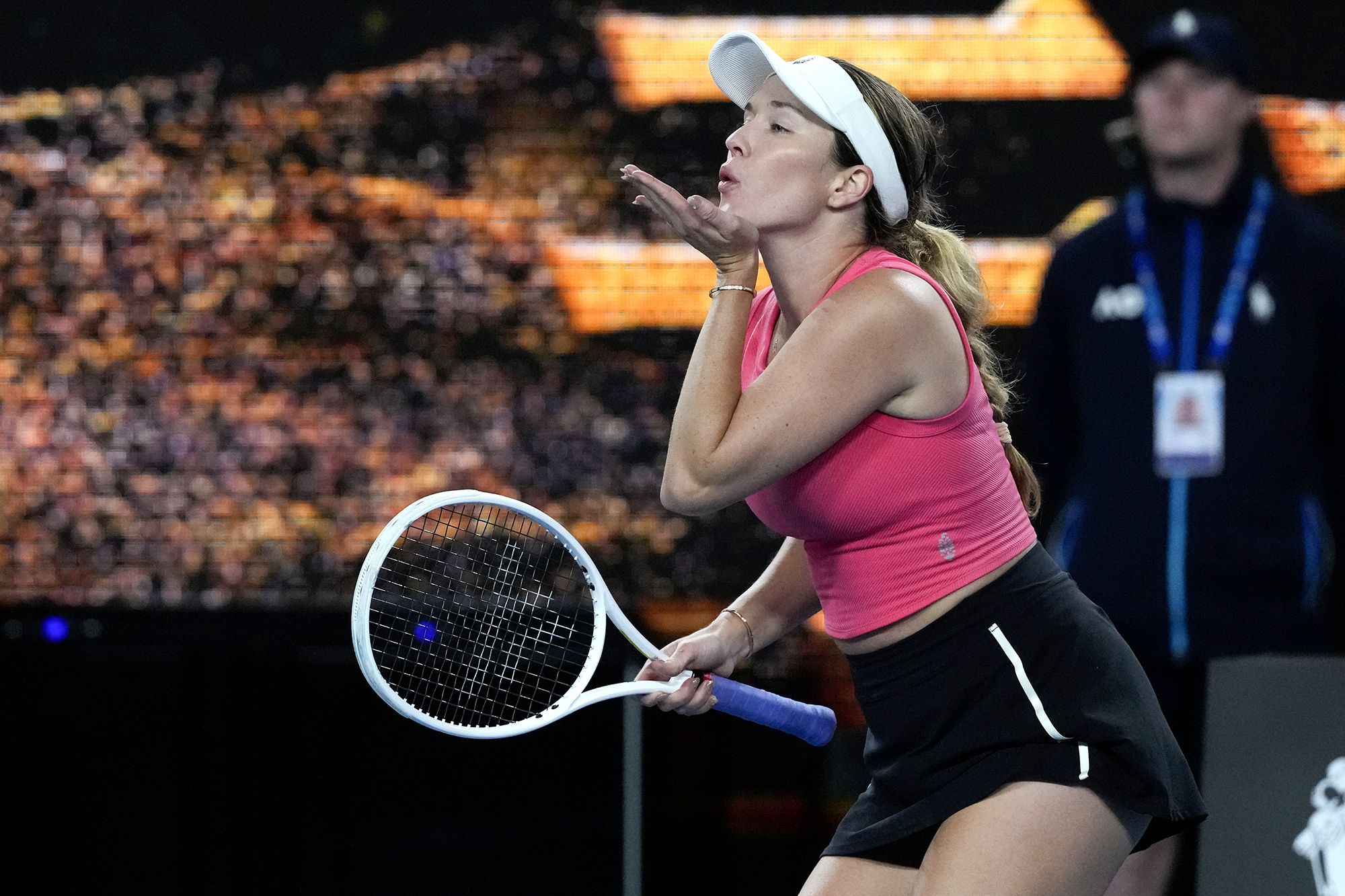 <i>Hannah Peters/Getty Images via CNN Newsource</i><br/>Danielle Collins cups her ear to the crowd after being booed.