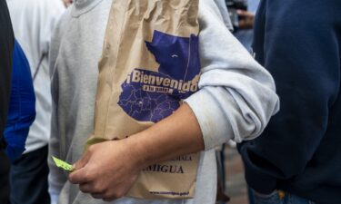 Dozens of deportees from the US are ushered to a reception center where first they are greeted by Guatemalan Vice President Karin Herrera and other officials in Guatemala City.