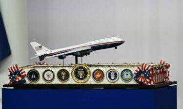 A cake representation of the new Air Force One design is displayed on stage during the Commander-In-Chief inaugural ball in Washington