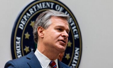 FBI Director Christopher Wray speaks to journalists at the Omaha FBI office on Wednesday