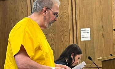 Former Spokesman-Review editor and University of Idaho professor Steve Smith reads a statement in court before being sentenced to 10 years in prison.