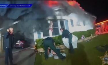 Body camera footage showcased the deputies’ heroic moments after one woman informed them a disabled and injured man was trapped inside a bedroom.