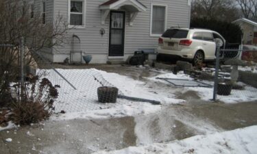 Anita Kowal says she was only 3 feet away from where the car hit her home.