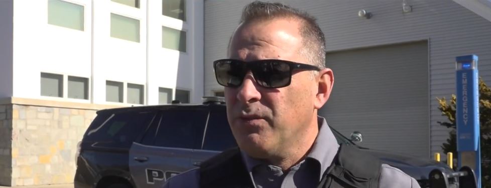 <i>WCBS via CNN Newsource</i><br/>West Long Branch Police Officer David Brosonski is seen trudging through the frigid