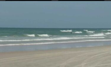 The driver made an immediate right turn toward the beach exit