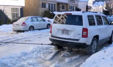 A water main break on Milwaukee's east side caused water to flood the area near Pleasant Street and Franklin Place. Tuesday afternoon. A whole city block of parked cars were stuck in a block of ice.