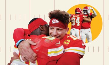 Chiefs head coach Andy Reid raises the Lamar Hunt Trophy after defeating the Buffalo Bills 32-29 in the AFC Championship game.