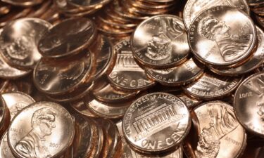 Recently struck pennies sit in a bin at the U.S. Mint in Philadelphia