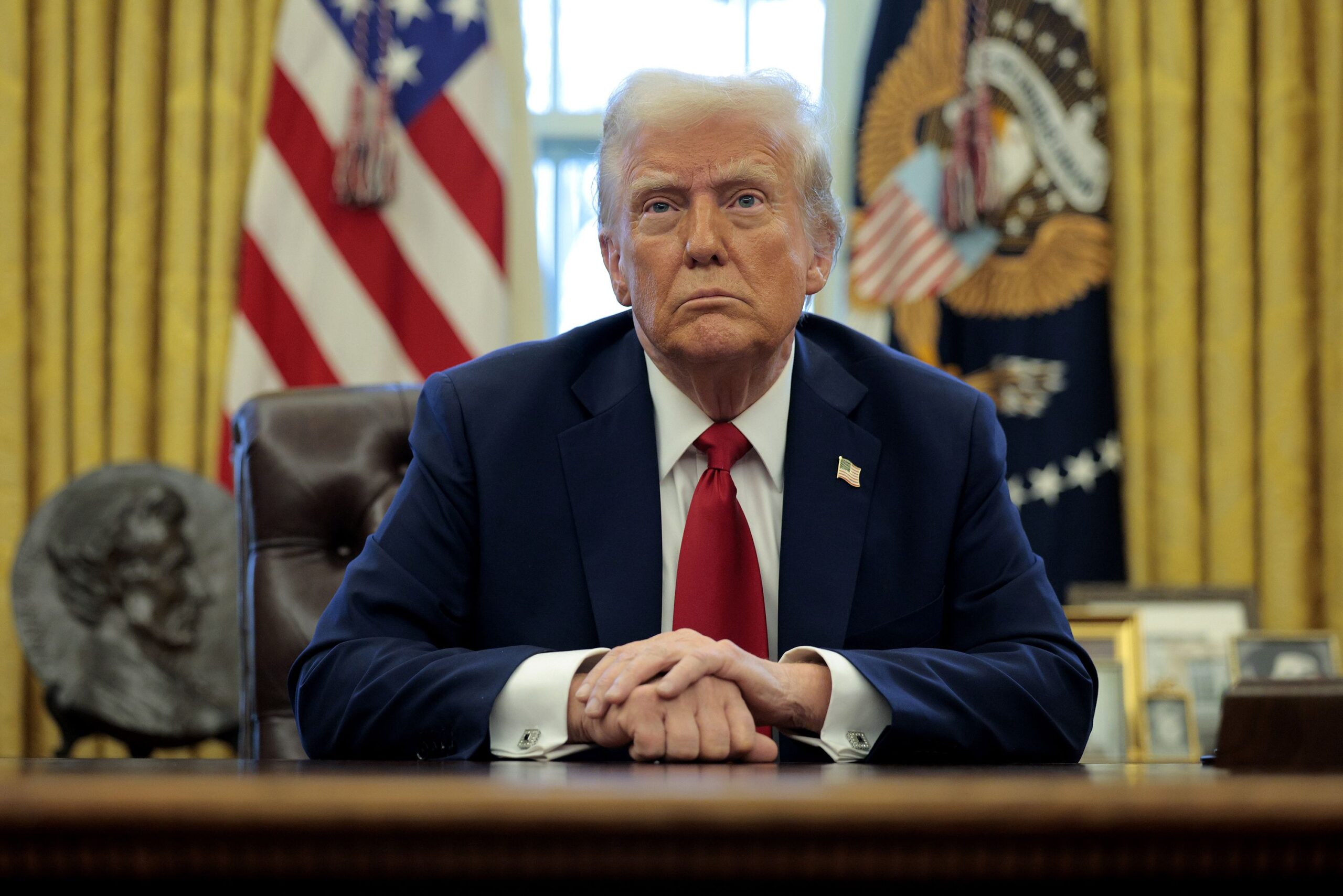 President Donald Trump speaks to reporters at the White House in Washington