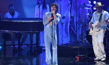 Benson Boone (C) performs on stage during the 67th Annual Grammy Awards on Sunday.