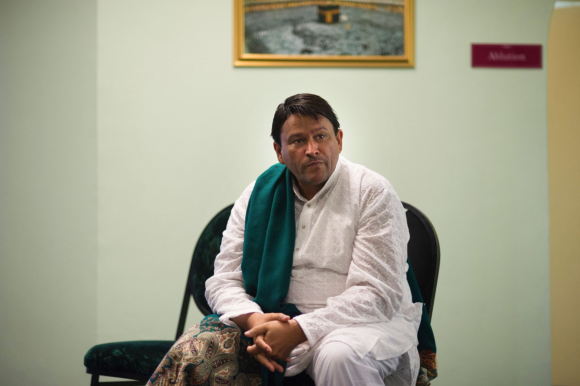 <i>Rodger Bosch/AFP/Getty Images via CNN Newsource</i><br/>Imam Muhsin Hendricks is pictured preparing for the start of the Jumu'ah prayer at the Inner Circle Mosque