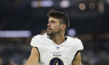 Justin Tucker walks back to the locker room after the Baltimore Ravens' game against the Los Angeles Chargers in November 2024.