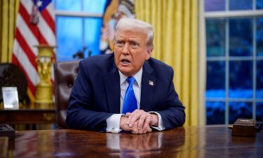 President Donald Trump speaks during an executive order signing in the Oval Office at the White House on February 11