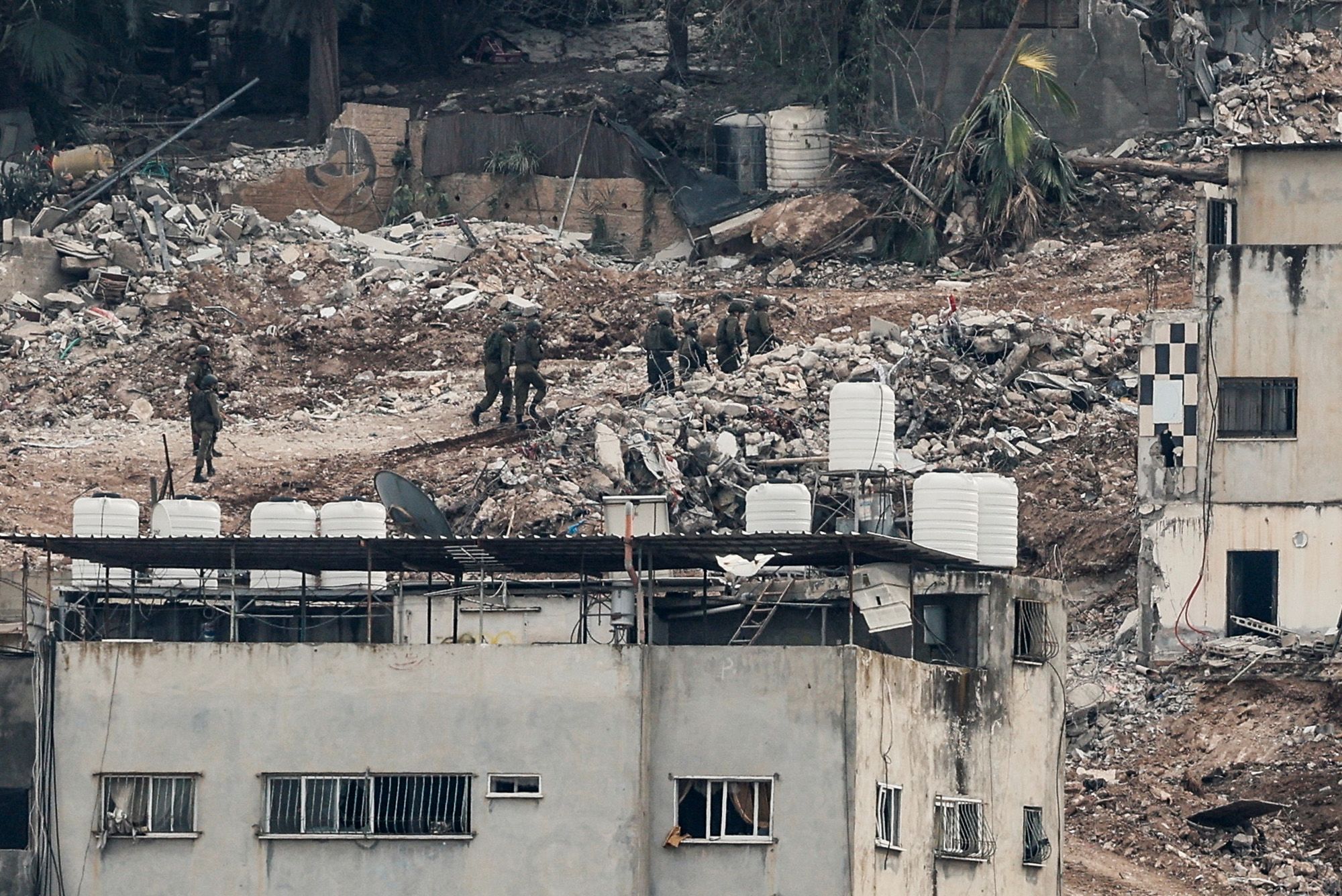 <i>Raneen Sawafta/Reuters via CNN Newsource</i><br/>Israeli troops in Jenin are pictured in the Israeli-occupied West Bank
