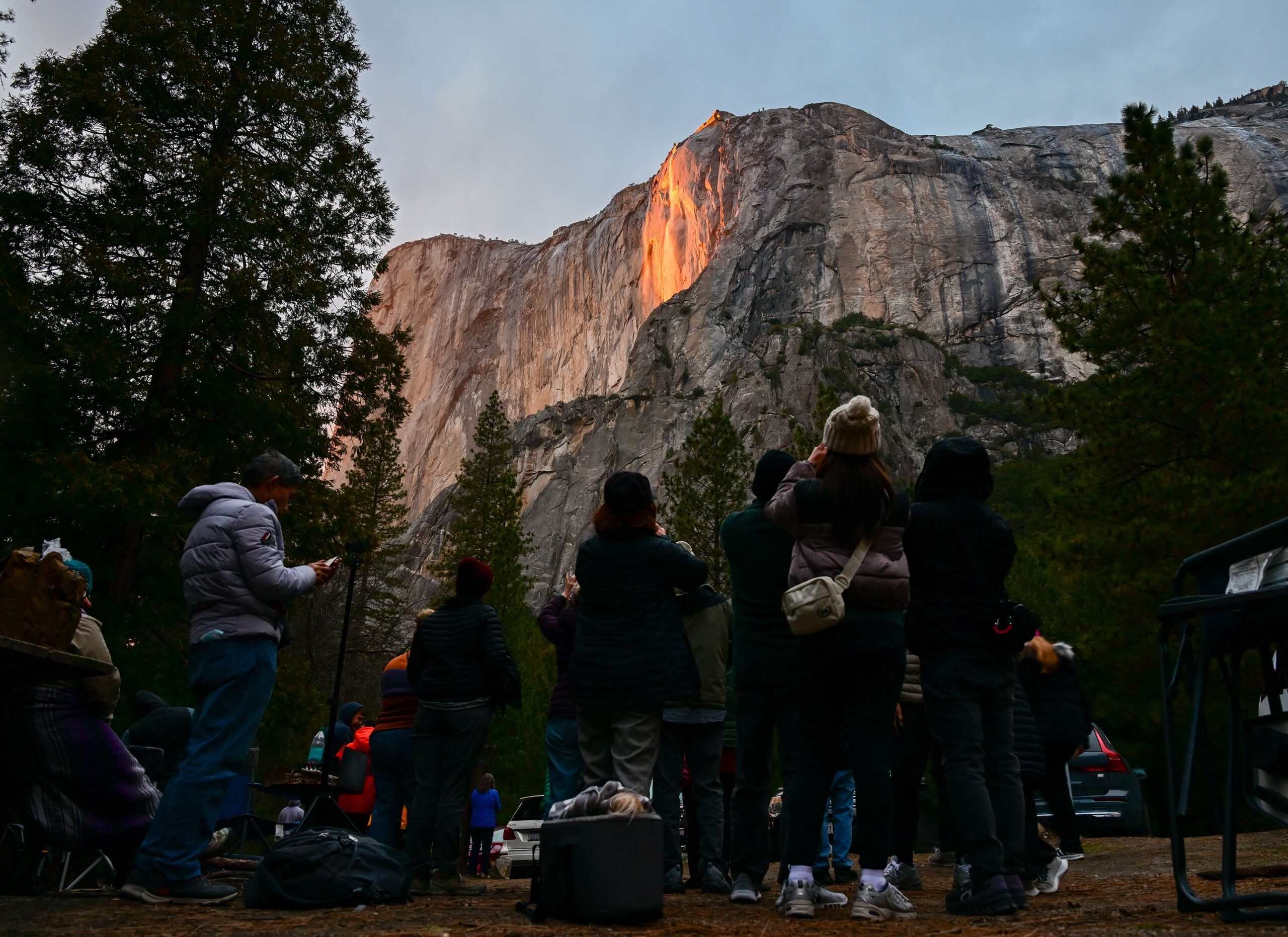 <i>Tayfun Cokun/Anadolu/Getty Images via CNN Newsource</i><br/>A view of the Firefall effect on El Capitan is seen here during sunset at Horsetail Fall in Yosemite National Park on February 19. Visitors to America’s national parks can expect shorter hours