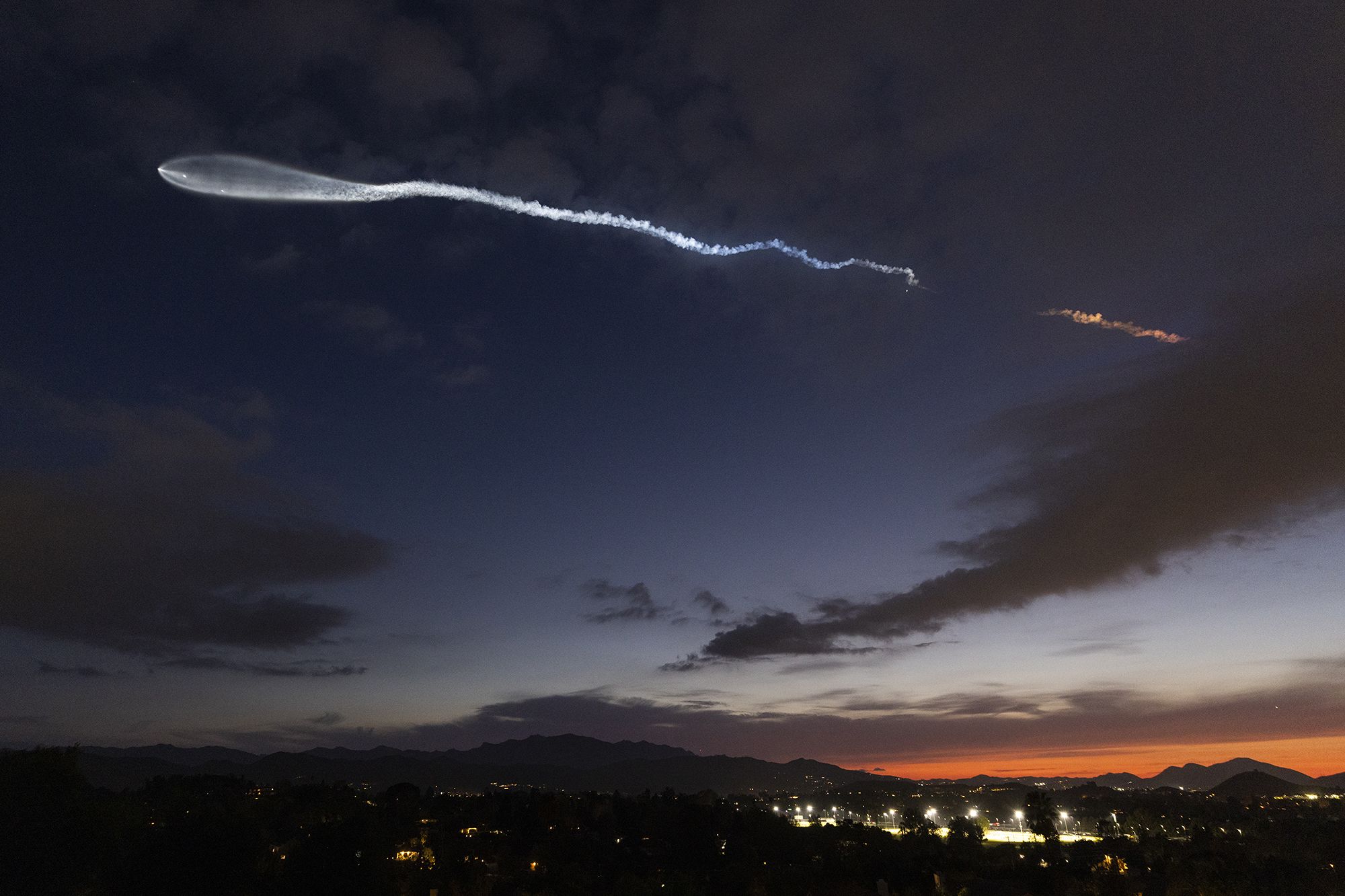 <i>Kevin Carter/Getty Images via CNN Newsource</i><br/>A SpaceX Falcon 9 rocket carrying a payload of 23 Starlink internet satellites soars into space after launching from Vandenberg Space Force Base earlier this month.