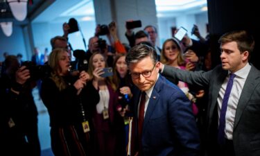 House Speaker Mike Johnson departs after speaking to reporters following a House Republican caucus meeting at the US Capitol on February 25 in Washington