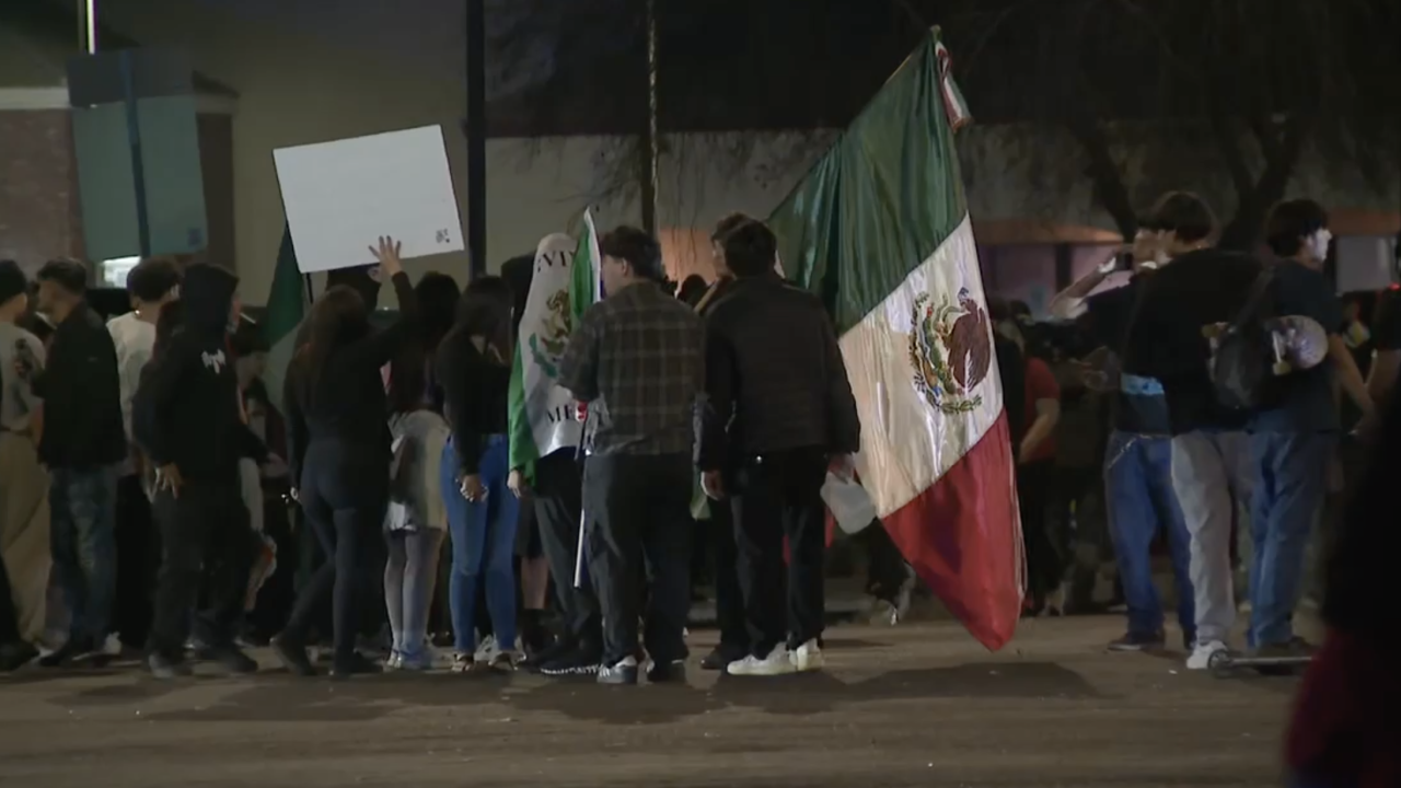 <i>KNXV via CNN Newsource</i><br/>A protest against immigration policies resulted in a police car being stolen and tear gas deployed in the West Valley Sunday night.