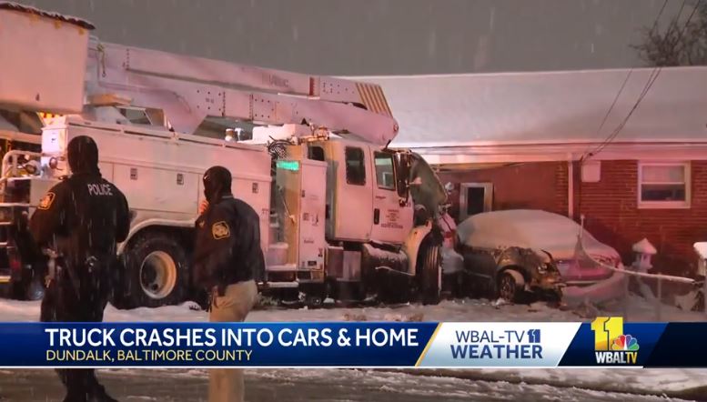 <i>WBAL via CNN Newsource</i><br/>A home is left with significant damage after a Hammer utility truck crashed into it during Tuesday night's winter storm.