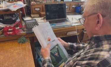 Joe Bertagna embroiders an image of David Ortiz's grand slam in Game 2 of the 2013 ALCS between the Red Sox and the Tigers.