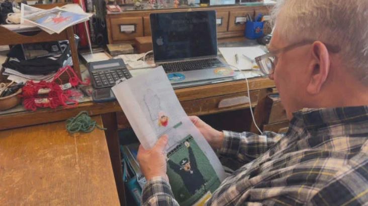 <i>WBZ via CNN Newsource</i><br/>Joe Bertagna embroiders an image of David Ortiz's grand slam in Game 2 of the 2013 ALCS between the Red Sox and the Tigers.