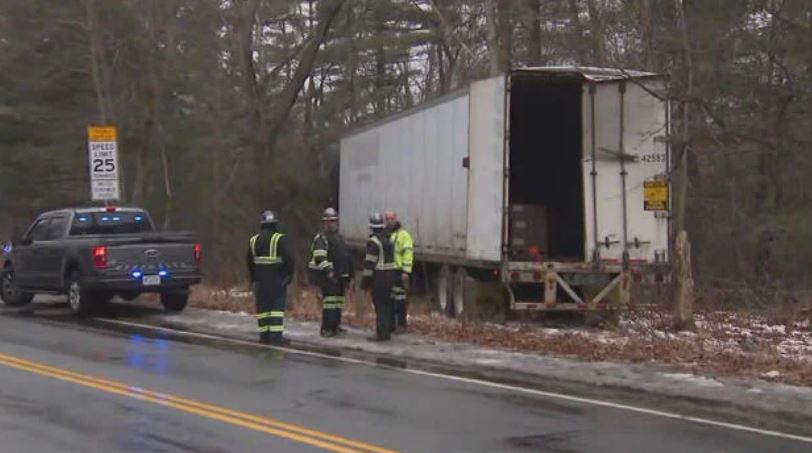 <i>WBZ via CNN Newsource</i><br/>A tractor-trailer driver fled after allegedly leading police on a chase on I-95 and crashing in Dedham.