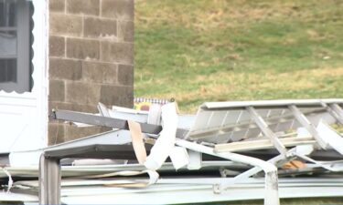 A woman is safe after high winds blew a porch right off of a home in Carroll Township
