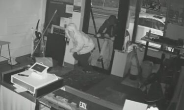 Thieves were caught on camera smashing their way into a Brighton business.
